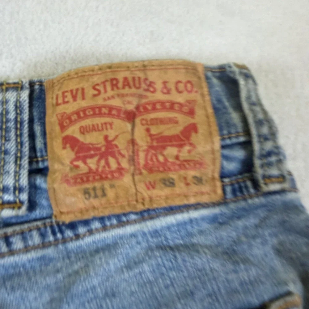 Levis 511 Slim Fit Jeans Mens 38x30 Light Wash Blue Denim Pants 04511-1856